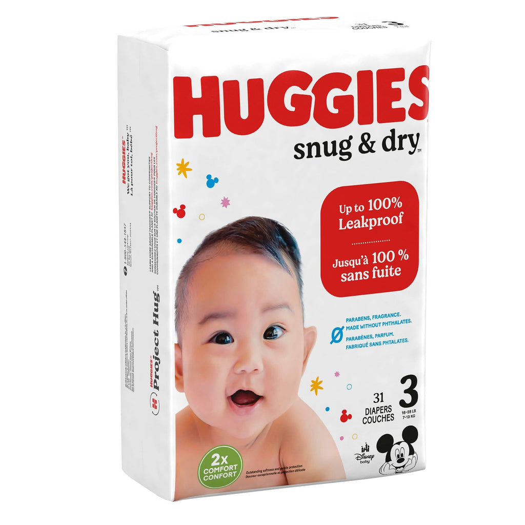 Unisex Baby Diaper Huggies Snug & Dry Size 3 Disposable Heavy Absorbency (31 Count) by Kimberly Clark, made in the United States, with heavy absorbency and elastic gathers, featuring a kid design (Disney), refastenable tabs, and a wetness indicator