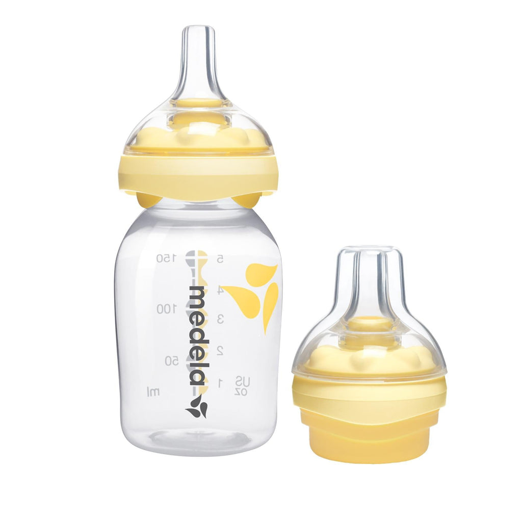 Clear plastic 5 oz Medela Calma® baby bottle with flow control valve and vented nipple